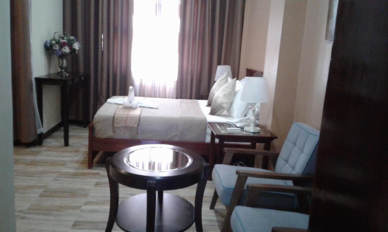 Charos Dormitel Hotel Dumaguete City Ngoại thất bức ảnh