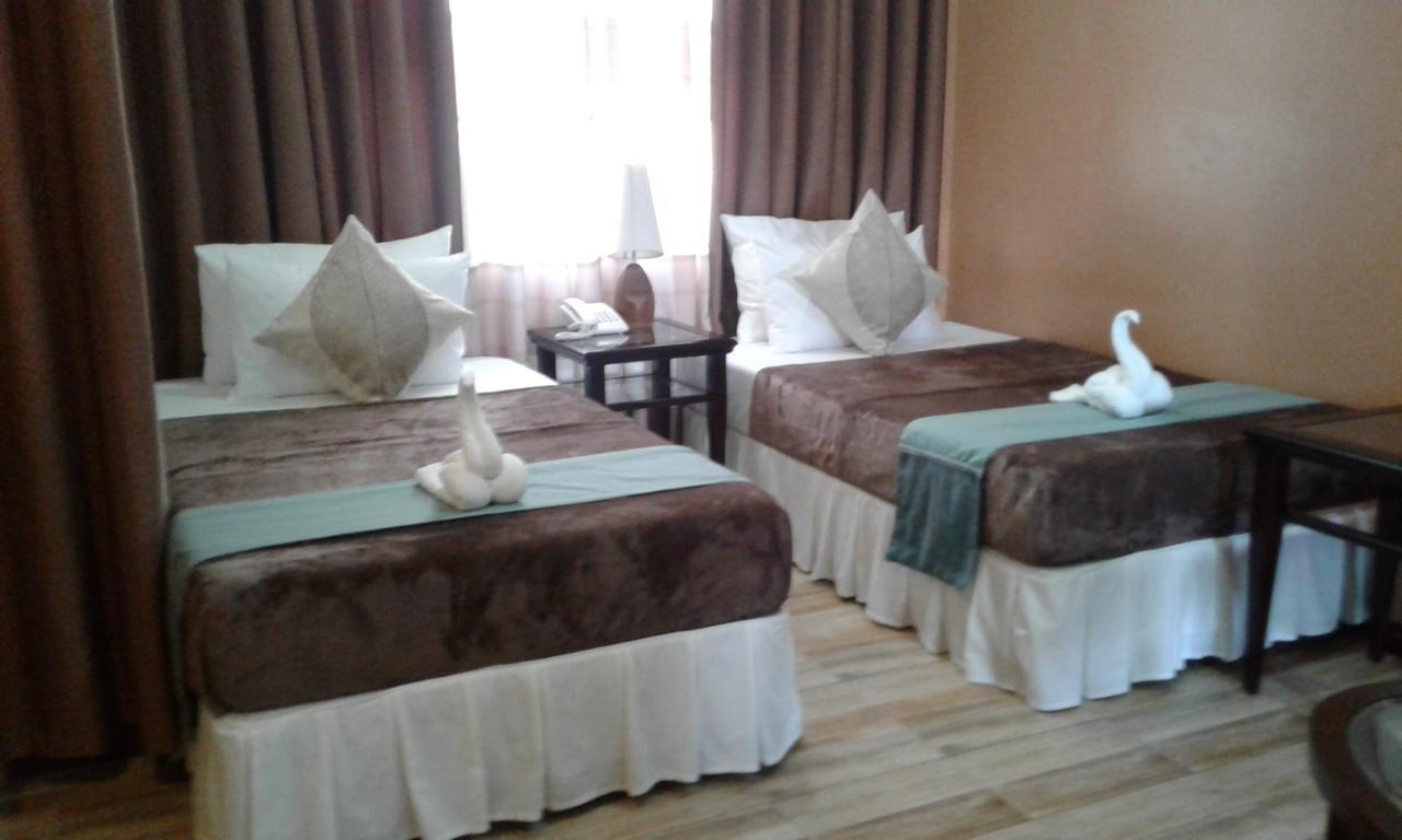 Charos Dormitel Hotel Dumaguete City Ngoại thất bức ảnh